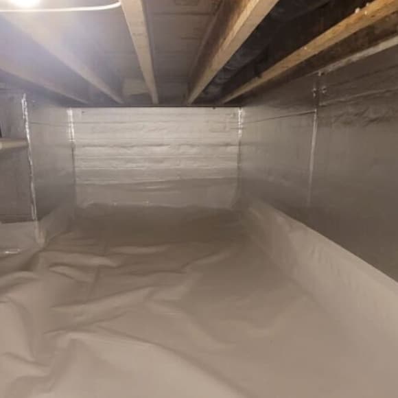 The LUX team expertly installing LUX Pro Select Polyiso Insulation Board for crawl space insulation in White Post, VA