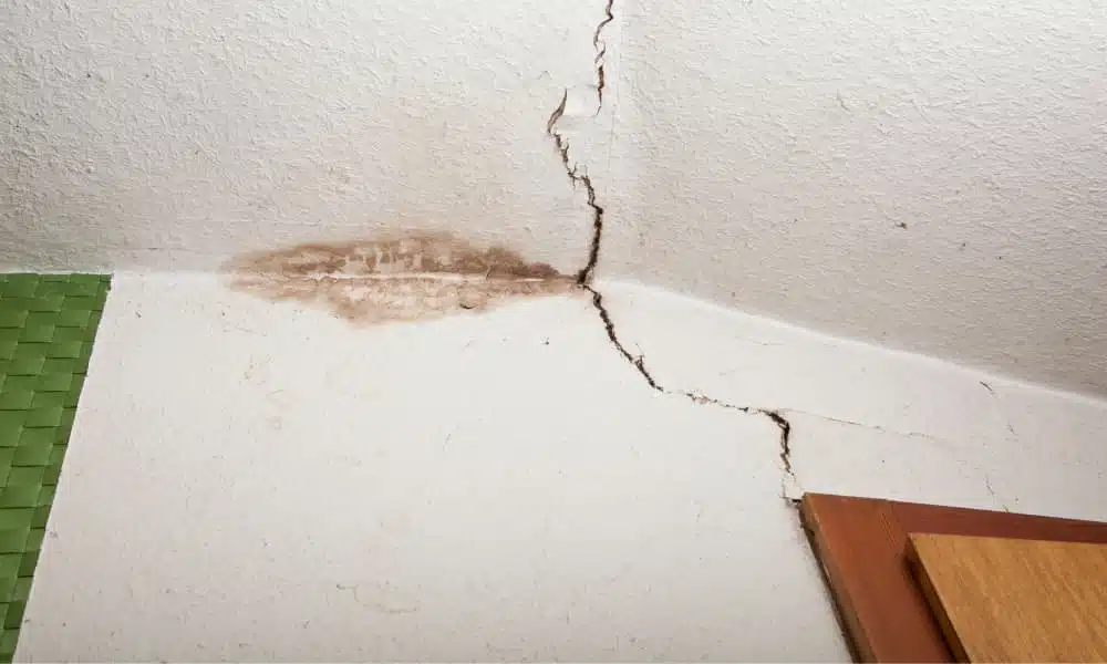 a ceiling with a severe ceiling crack in it