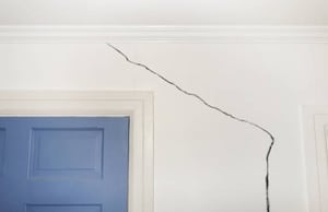 A cracks in the wall near the door frame, a clear sign that there is a gap between floor and wall in Manassas, VA