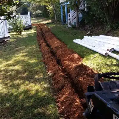 A yard drainage installation in Charles Town, WV, a solution to mitigate moisture and address a wet or damp crawl space.
