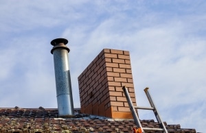 A leaning chimney, as a sign of a sinking foundation in Alexandria, VA.