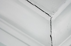 Visible cracks in the ceiling, one of the signs of above the crawl space floor sagging in Berkeley, WV.