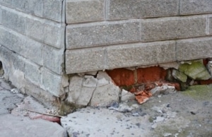 A crumbling foundation concrete edges, a clear indication of foundation cracks in Flint Hill, VA.