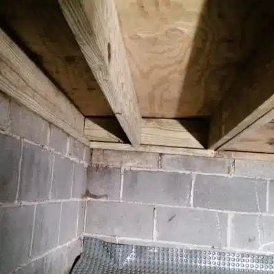 A crawl space floor joists sistering in Fairfax, VA, a solution to address floor sagging and structural issues in crawl space.