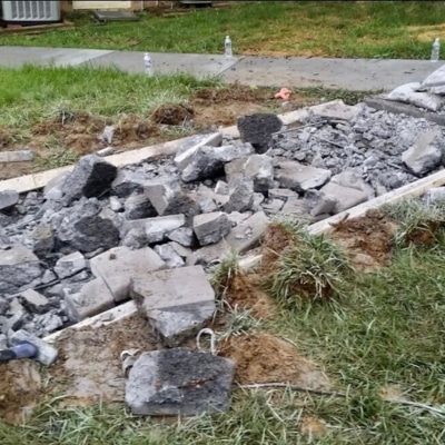 A demolished wall for full concrete demolition and replacement in Fairfax, VA, as a solution for severe chipping concrete.
