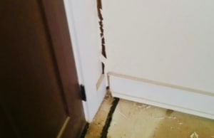 A gap between the wall and the floor, indicating potential structural concern or sign of drywall cracks in Harpers Ferry, WV