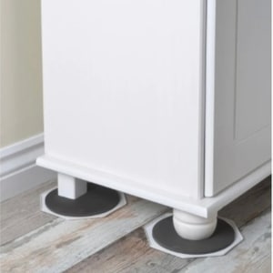 A cabinet with its legs pressing heavily into the floor, showing heavy furniture, can cause the floor sagging in Gainesville, VA.