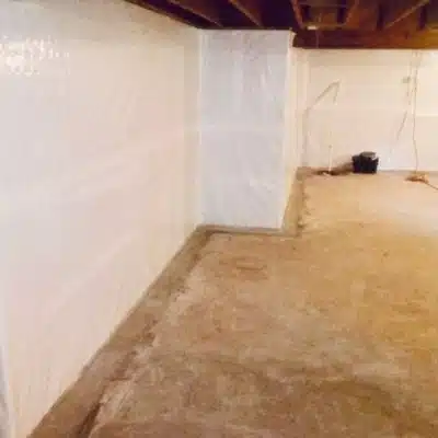 A basement with installed interior waterproofing in Stephens City, VA, an effective solution to sinking foundation problems.
