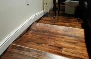 A sagging floor above the crawl space, a sign of moisture intrusion and crawl space condensation in Gainesville, VA.