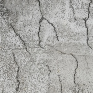Shrinkage on the surface, a contributing factor to cracks in the basement floor in Martinsburg, WV