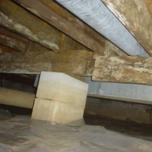 A crawl space supports that are sinking, a sinking crawl space supports as cause of sticking doors and windows in Linden, VA.