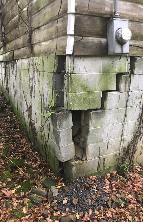 Deep crack and misalignment in foundation, a sign of sinking foundation that needs sinking foundation repair in Northern Virginia.