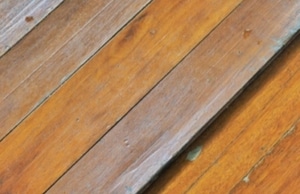 A raised and sloping wood floor with noticeable springiness, illustrating as signs of unlevel floors in Front Royal, VA.