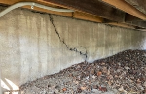 A vertical crack in the crawl space wall, one of a sign of foundation cracks in Manassas, VA