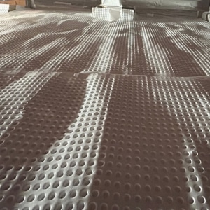 A well-installed crawl space drainage matting in, as a protective shield to effectively repel groundwater seepage.