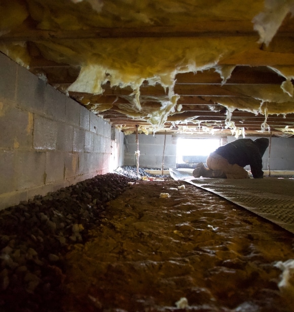 LUX team installing drainage matting as part of effective crawl space drainage installation in Martinsburg, WV