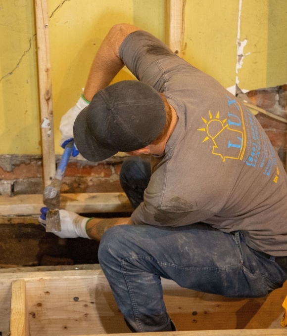The LUX team doing the crawl space beam replacement in White post, VA to provide maximum support, strength, and durability
