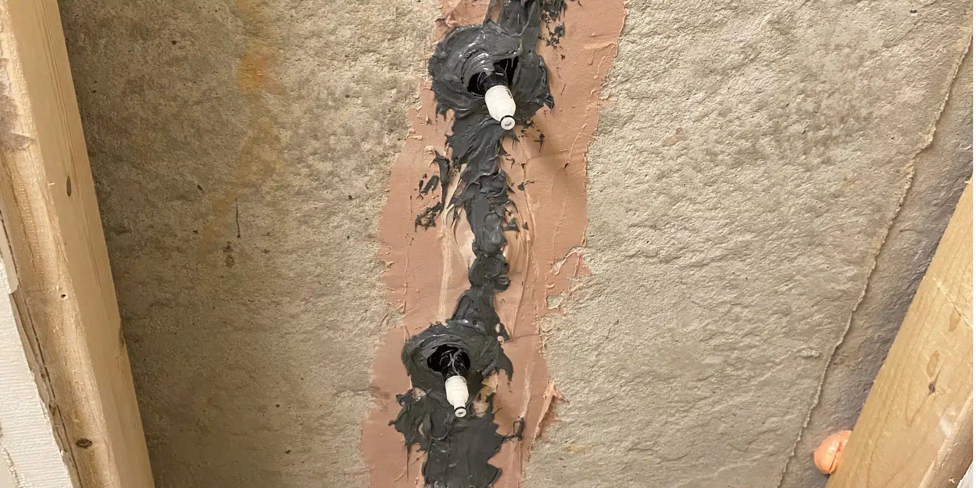 Close-up image of concrete foundation crack repair installation in Ashburn, VA