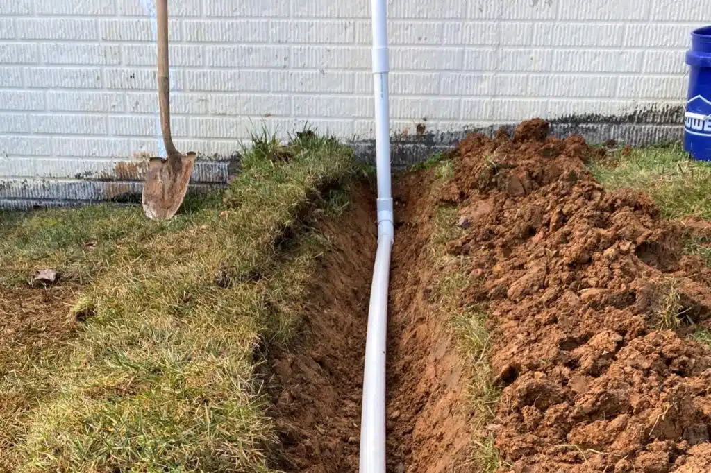 The Benefits of Installing Buried Downspouts