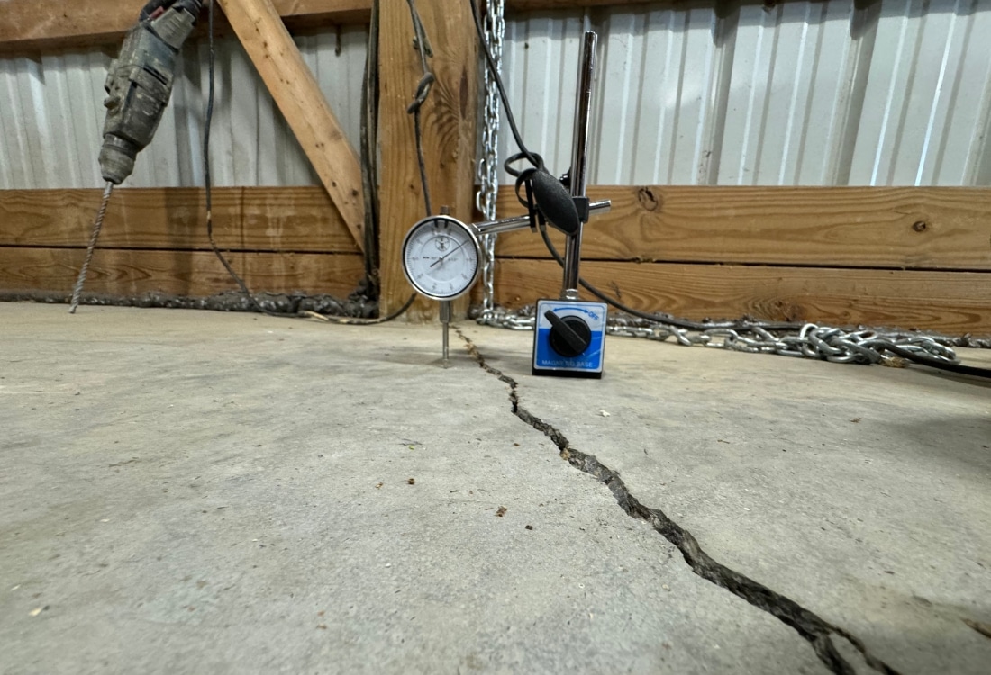 Cracked and uneven concrete slab before foam concrete lifting in Strasburg, VA.