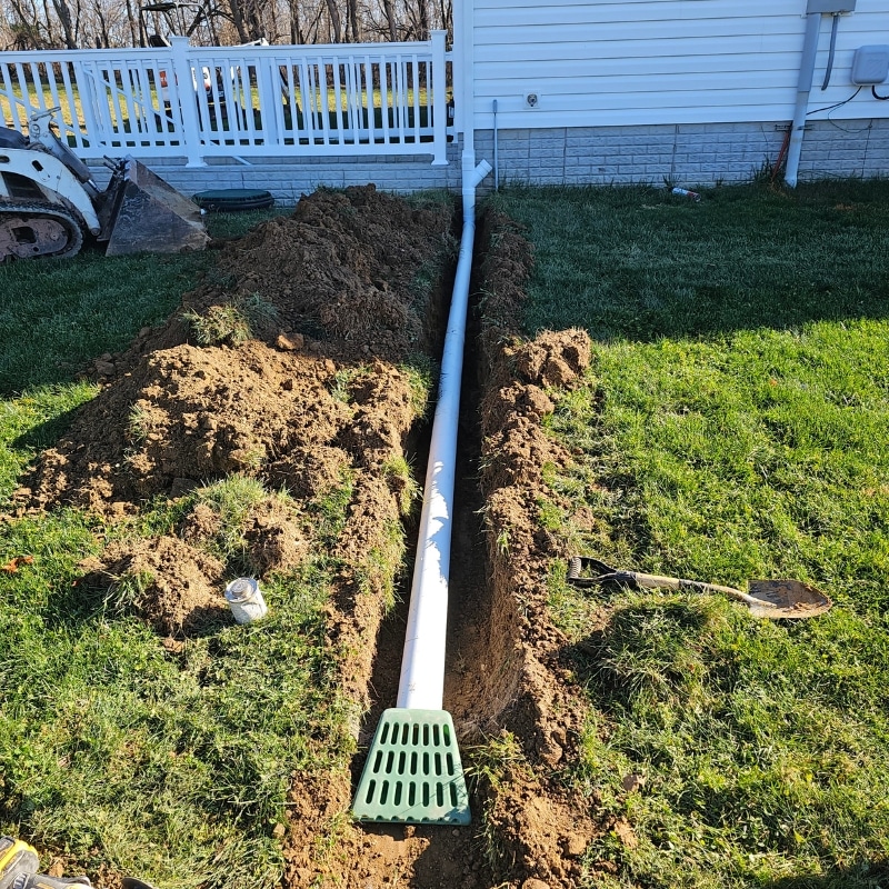Installed French drains to solve uneven sidewalks in Berkeley, WV, by improving drainage and preventing water pooling.