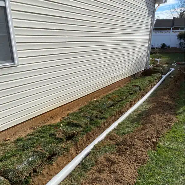 French drain installed outside the foundation to prevent basement water seepage due to excessive rainfall in Flint Hill, VA.