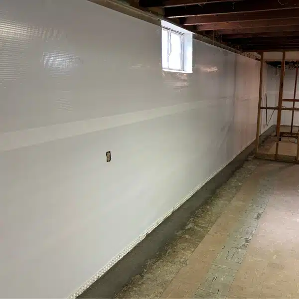 Installed interior basement waterproofing system to prevent water seepage caused by excessive rainfall in Berkeley, WV.