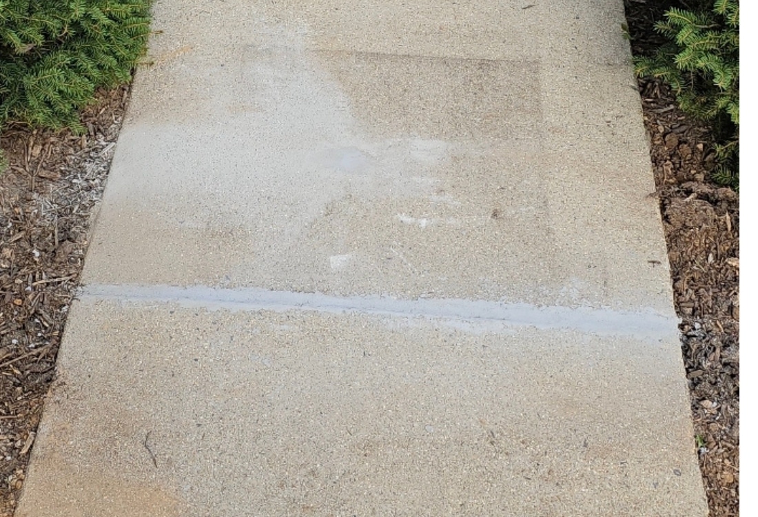 Restored and smooth sidewalk after concrete sidewalk repair in White Post, VA, ensuring safety and functionality.
