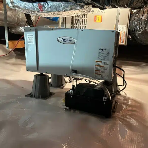 A high-performance dehumidifier installed in crawl space to control humidity and prevent high moisture levels in Flint Hill, VA.