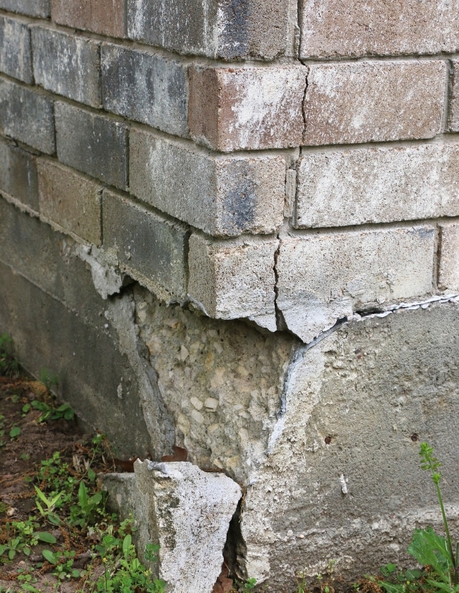 Foundation cracks caused by droughts and heavy rainfall in Ashburn, VA, requiring foundation repair to prevent further damage.