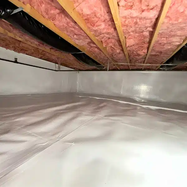 A fully encapsulated crawl space with vapor barriers on walls and floors, preventing mold growth and high moisture levels in Warrenton, VA.