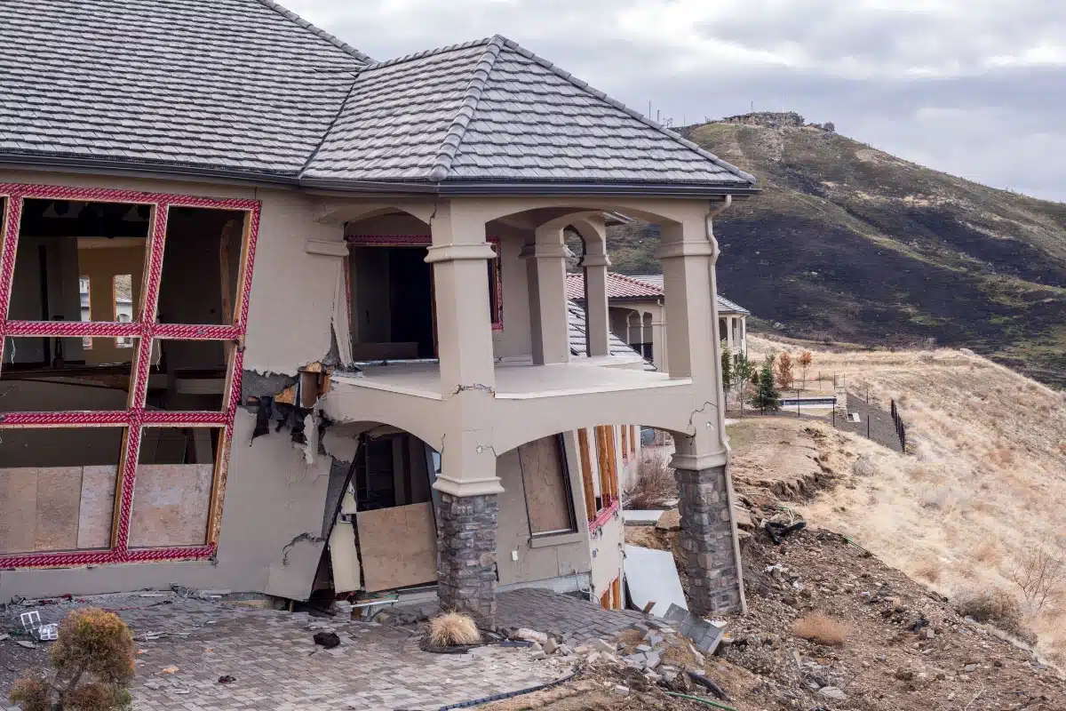 Foundation severely damaged by a landslide, showing the impact of ground movement during a natural disaster in Berryville, VA.