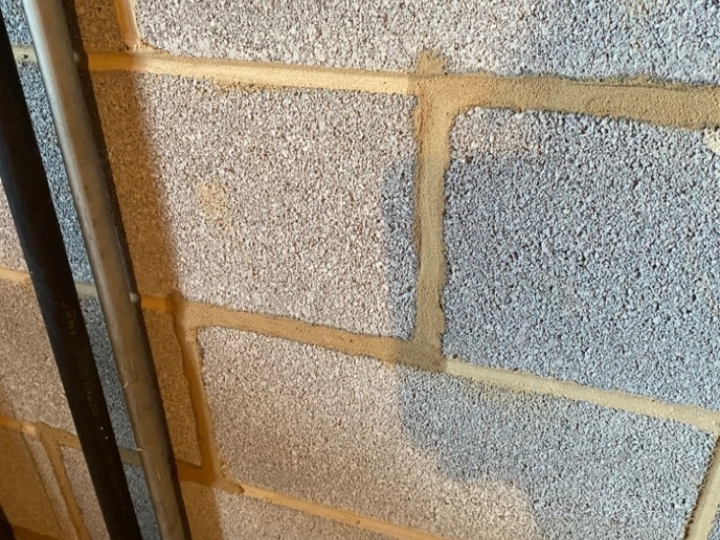 Repointing stair-step cracks with mortar in Clear Brook, VA, to prevent moisture intrusion and stabilize foundation walls.