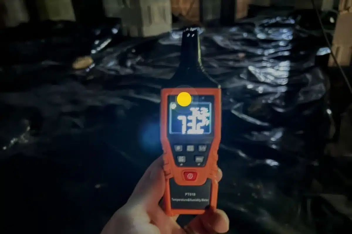 Hygrometer showing high crawlspace humidity levels, caused by uncontrolled humidity from open vents Alexandria, VA.