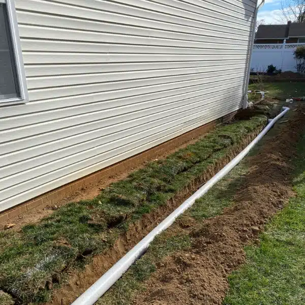 Installed French drain to redirect water on the crawl space foundation and reduce pressure from expansive soil in Manassas, VA.