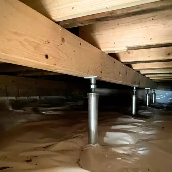 Installed adjustable steel crawl space support posts to stabilize uneven floors from improper support system in Reston, VA.