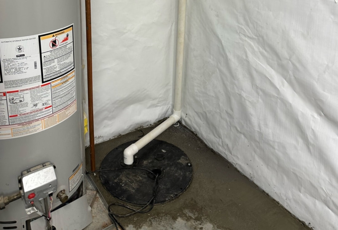 A waterproofed basement with a drainage system, sump pump, and French drain to stop basement leaks when it rains in Winchester, VA.