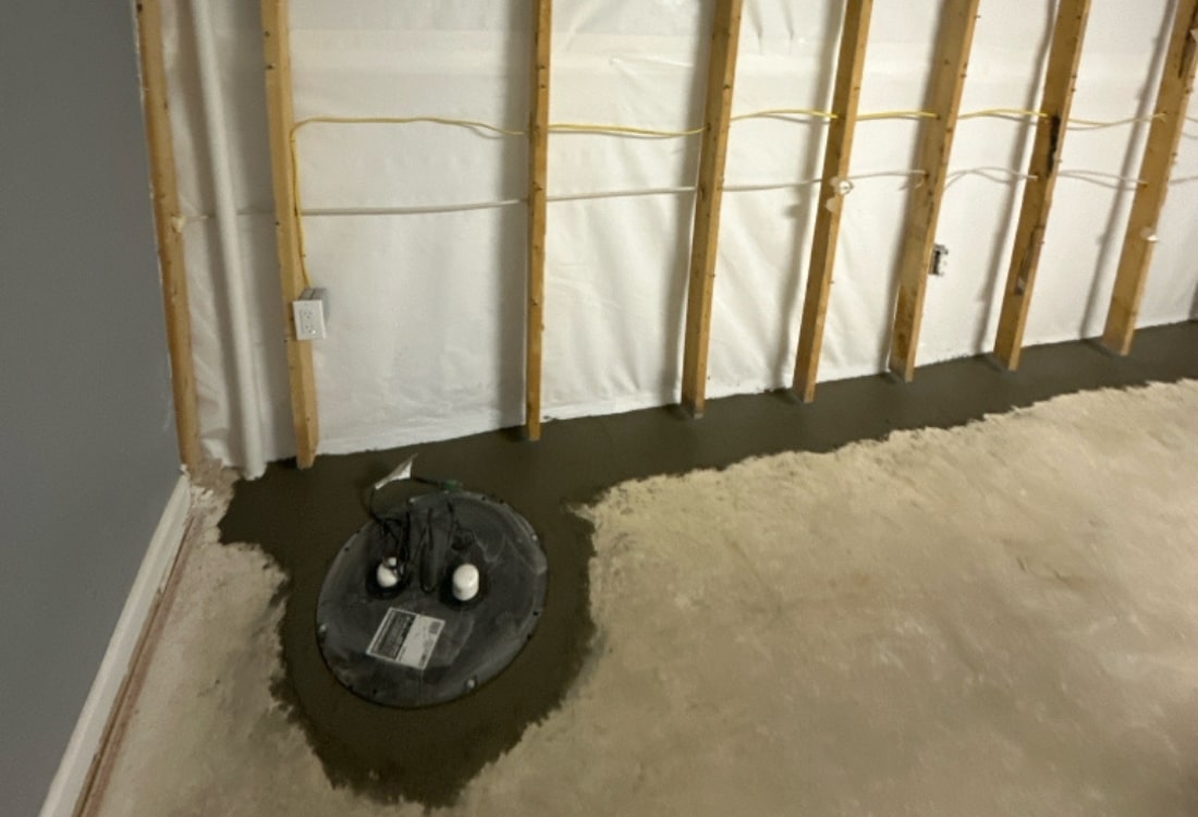 A dry and protected basement from water intrusion after sump pump installation in Charles Town, WV.