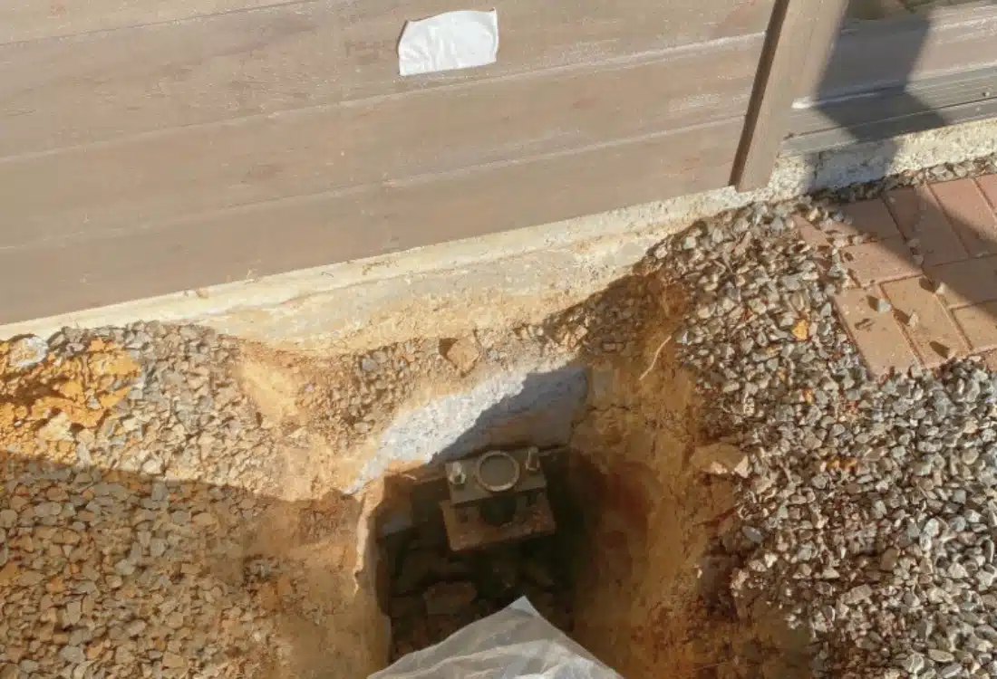 A stabilized home after foundation sinking repair in Winchester, VA, with push pier and wall pin installation.