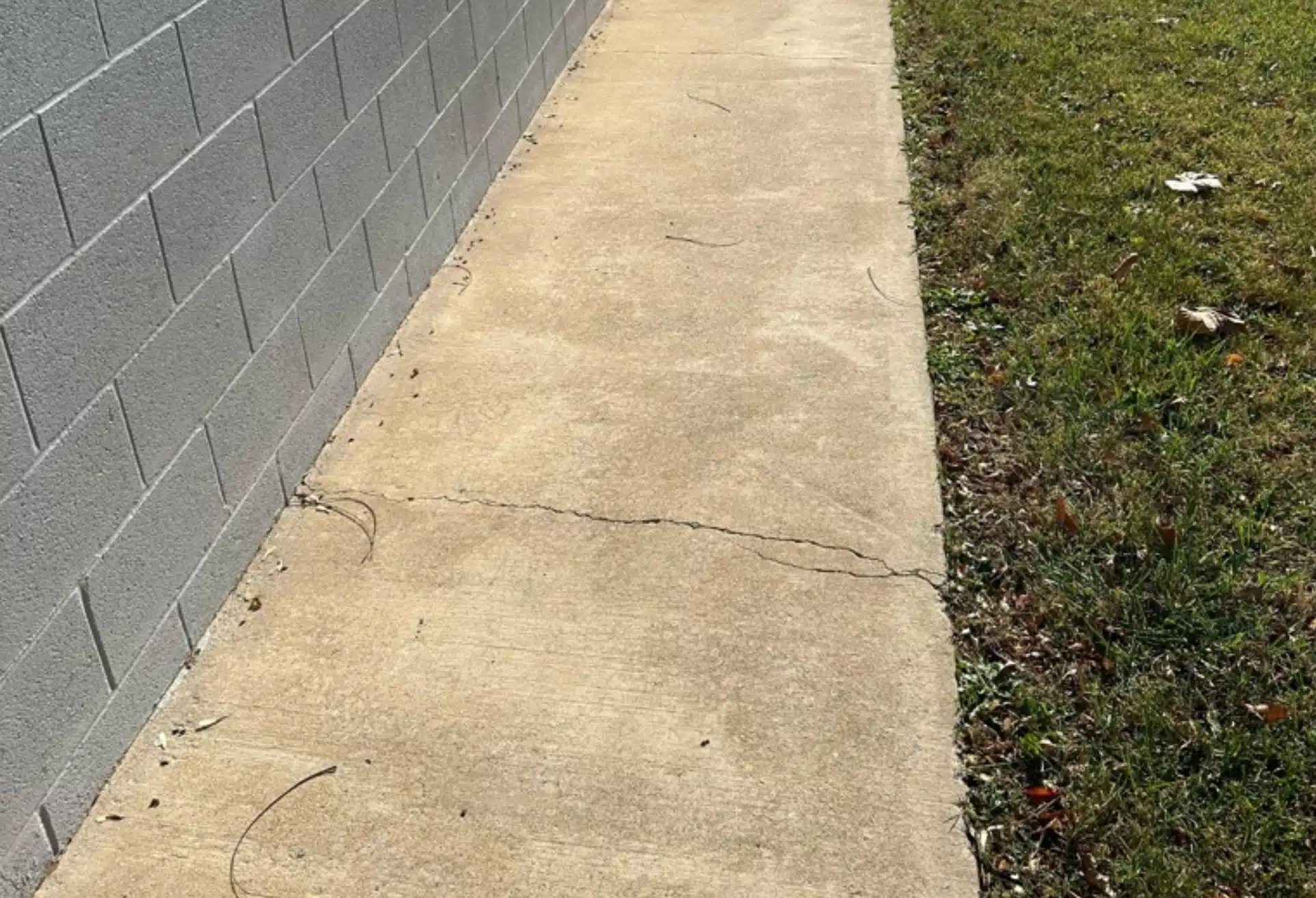Foundation shifting and cracks in the walls and floors, showing the instability before push piers and slab replacement in Woodstock, VA