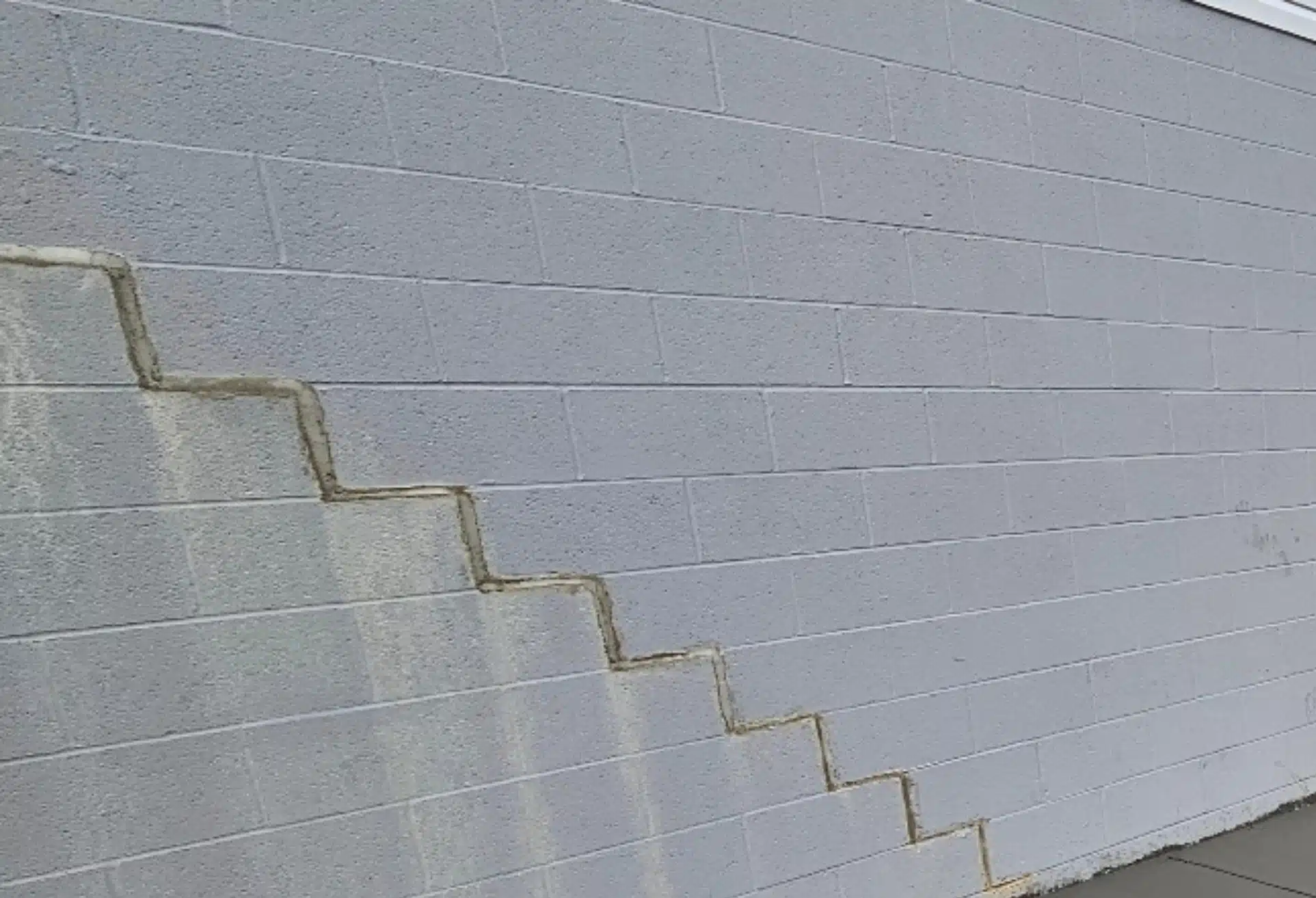 Foundation shifting, uneven slabs, and visible cracks in Warrenton, VA, showing structural instability and the need for professional repair.