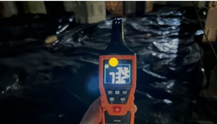 Hygrometer measuring high crawl space humidity in Fairfax, VA, indicating the need for expert crawl space repair service.