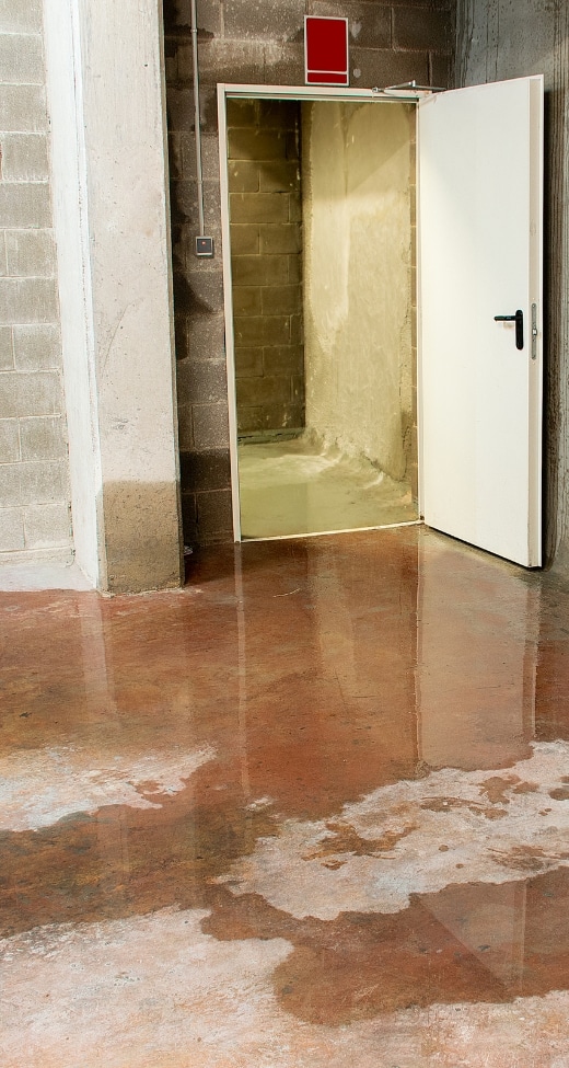 Basement floor showing water seepage, illustrating the causes of basement water damages in Harpers Ferry, WV.