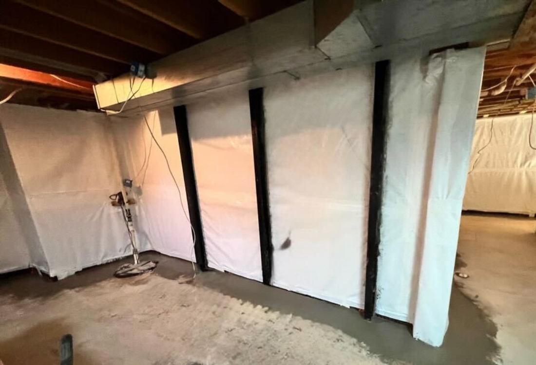 Reinforced and moisture-free basement after wall stabilization and basement leak repair in Winchester, VA.
