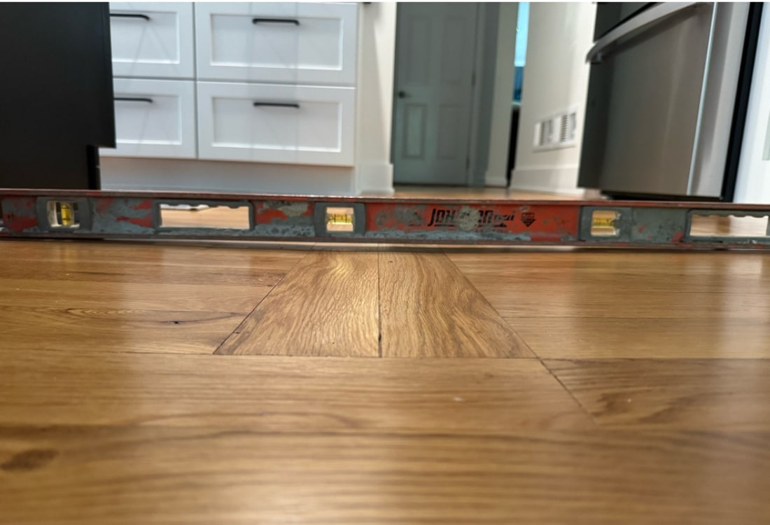 Uneven floor in kitchen caused by sagging floor joists in Berryville, VA, indicating crawl space issues.