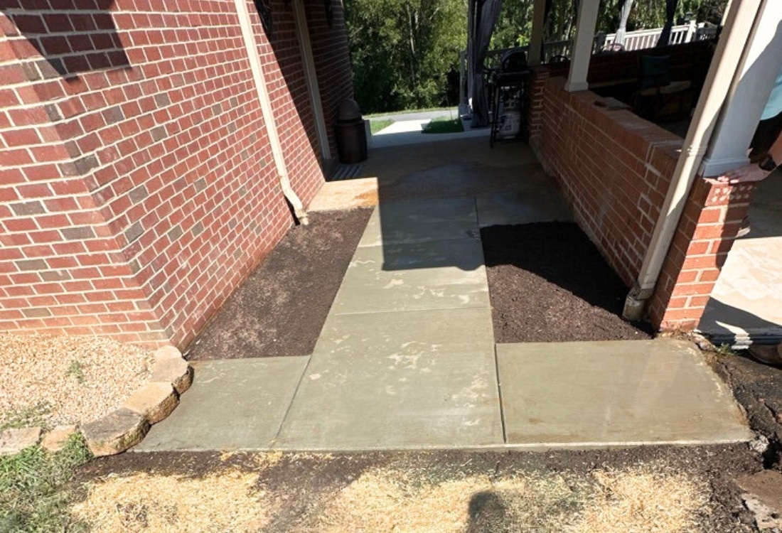 Smooth, durable concrete walkway installed in Winchester, VA, providing safe and low-maintenance outdoor access.