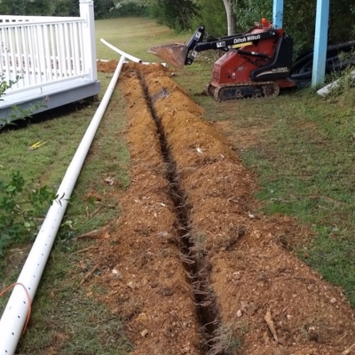 Landscape French drains installed to prevent water pooling near home, damp crawl space solutions in Charles Town, WV.