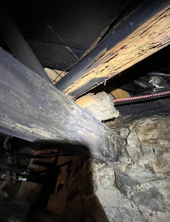 Severe decaying of the beam and joist, a sign of a crawl space problem that needs crawl space wood rot repair in Northern VA.