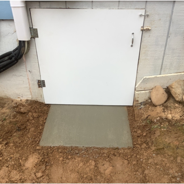 New installed sealed crawl space access door to block moisture and pests, a crawl space repair solution in Stephens City, VA.
