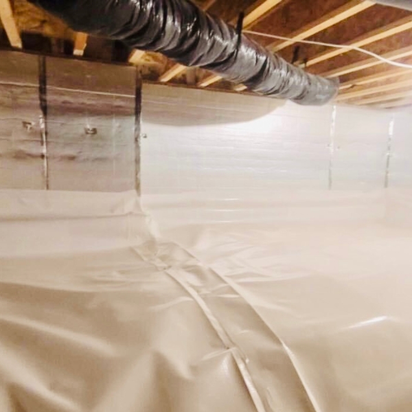 Crawl space insulation and wall liner installed to control moisture and airflow, a crawl space repair solution in Berryville, VA.